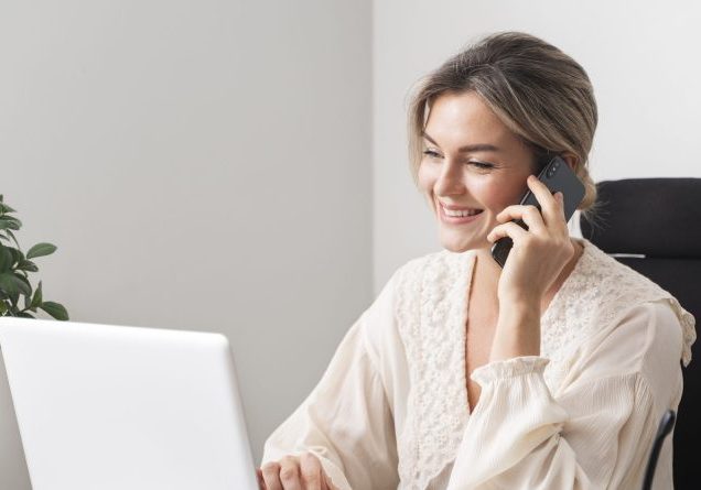 medium-shot-smiley-woman-talking-phone