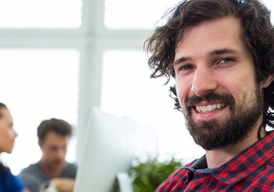 Portrait of male graphic designer with arms crossed
